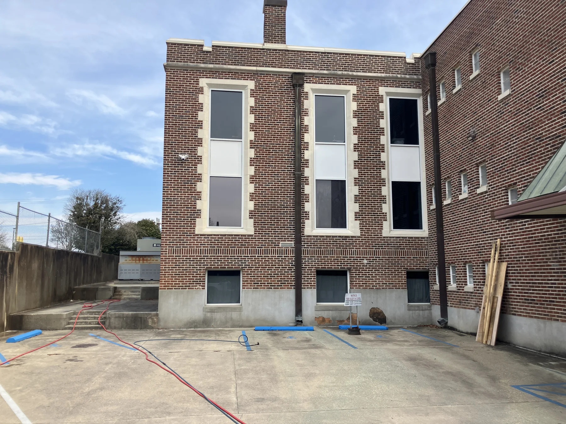 Brick commercial building and the surrounding work area